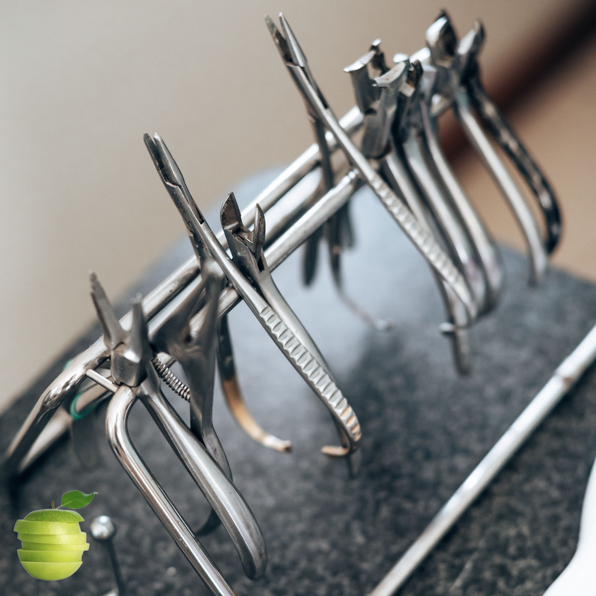 Braceways: Post with orthodontic pliers on a rack