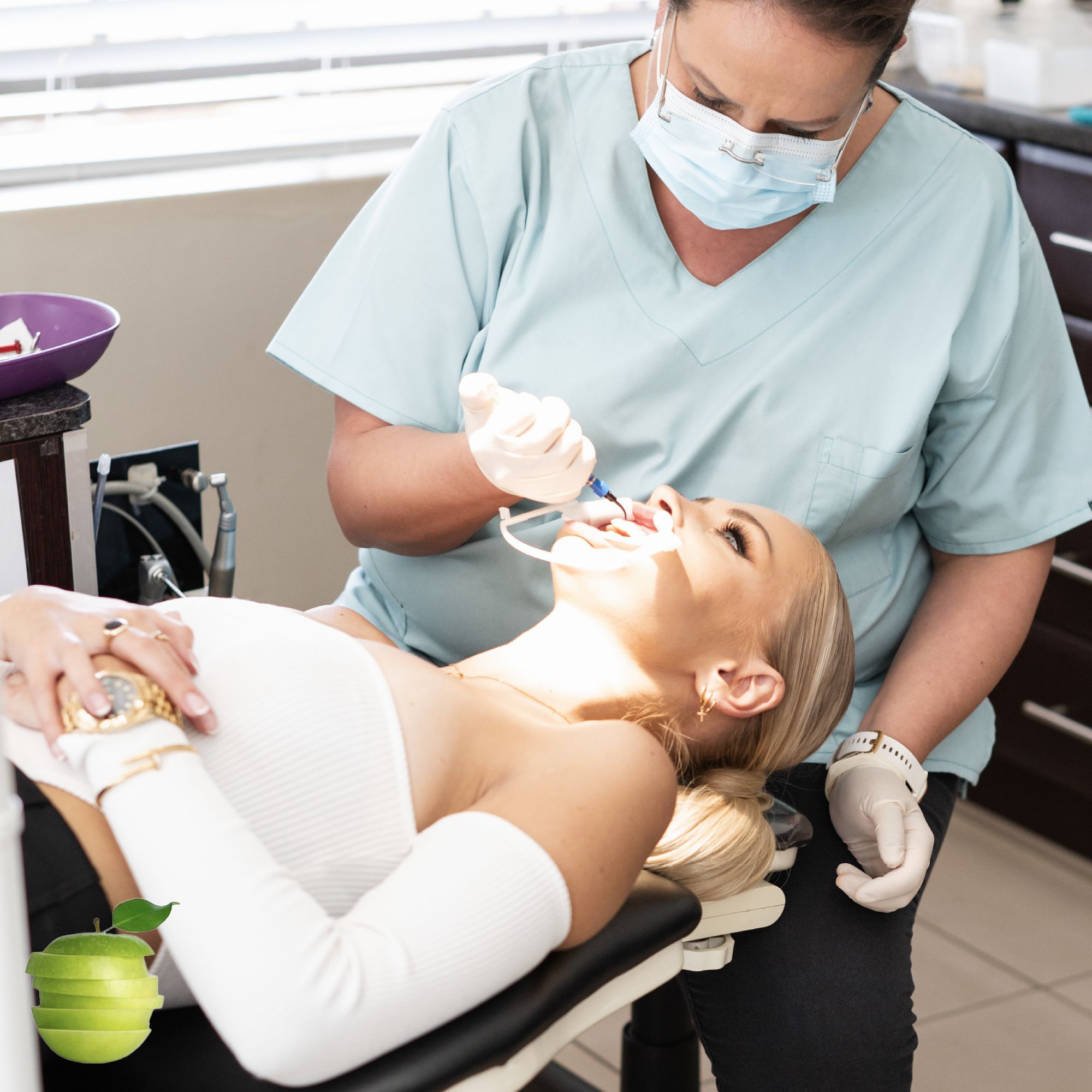 Braceways: Post with a patient in the chair and a masked dental assistant