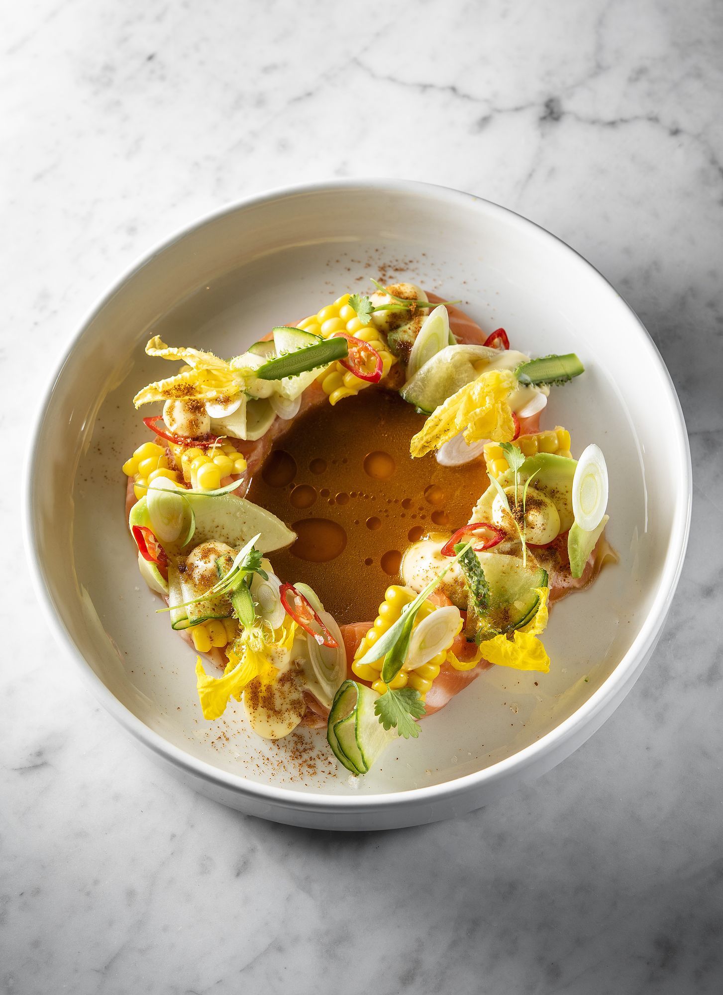 Double Dutch: Plated dish with a ring of colourful garnish