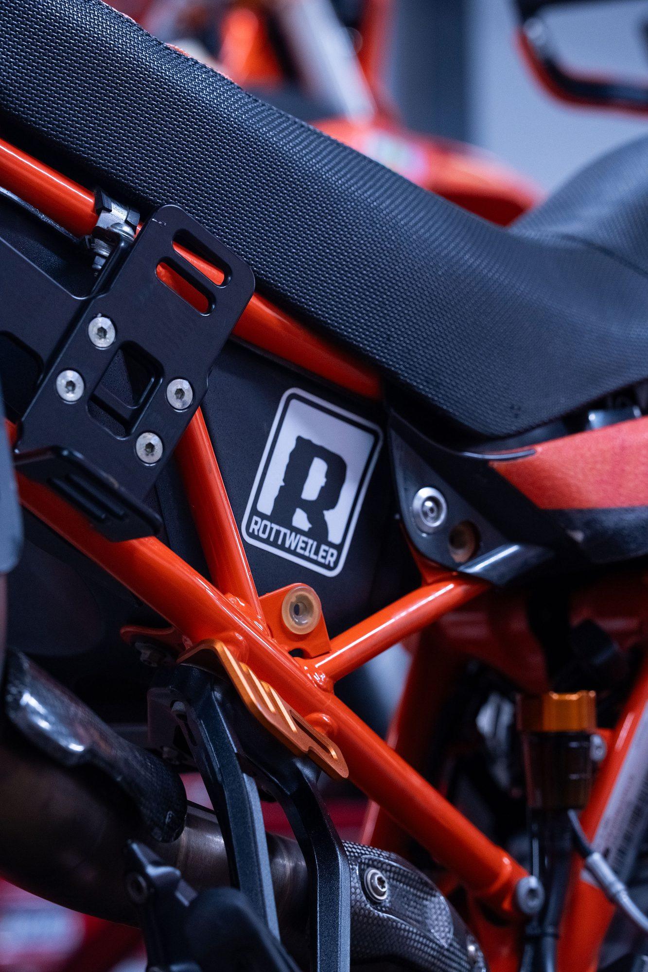 Raceworx: Detail of an orange trellis frame and seat